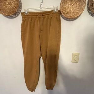 Mustard yellow Adidas sweatpants